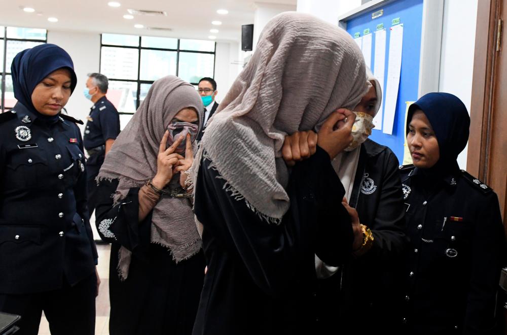 Four, including three in a family, charged with money laundering involving over RM300m Four, including three in a family, charged with money laundering involving over RM300m