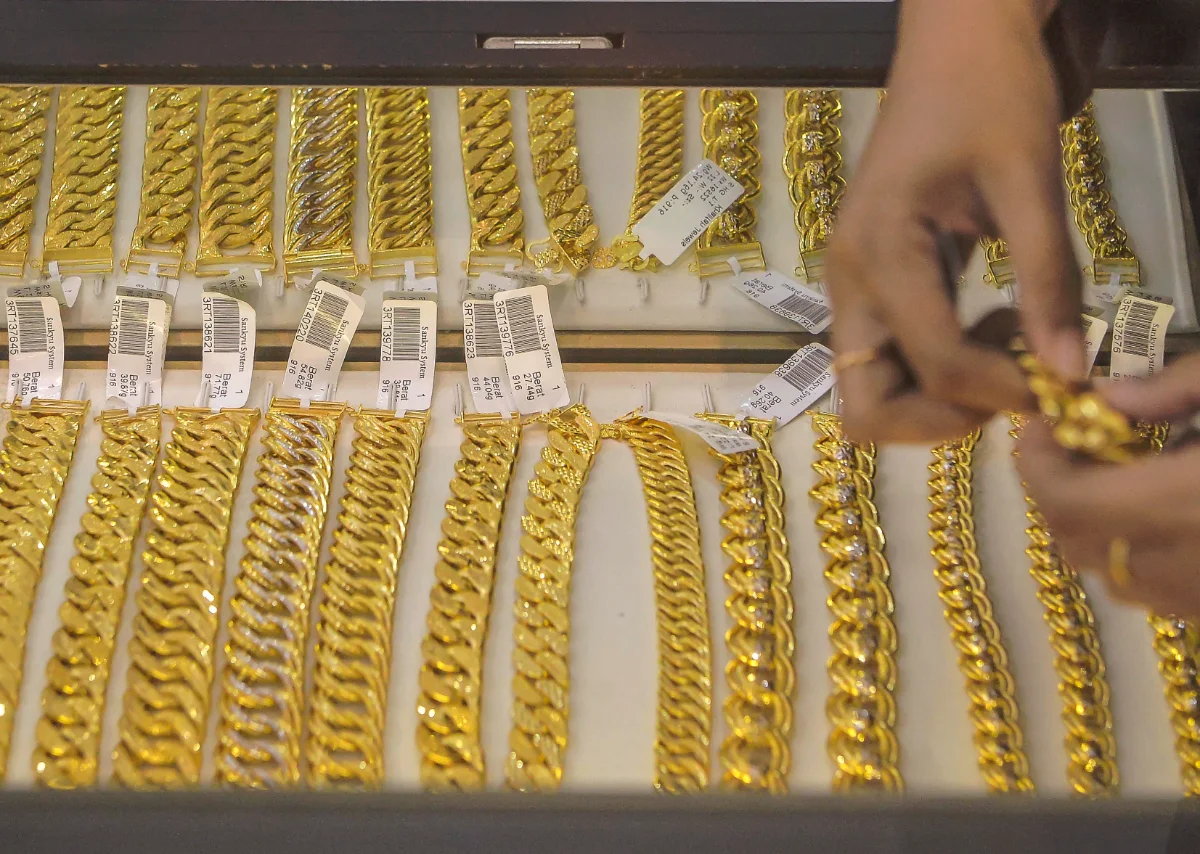 Gold_price_dips_below_USD5_000_per_troy_ounce