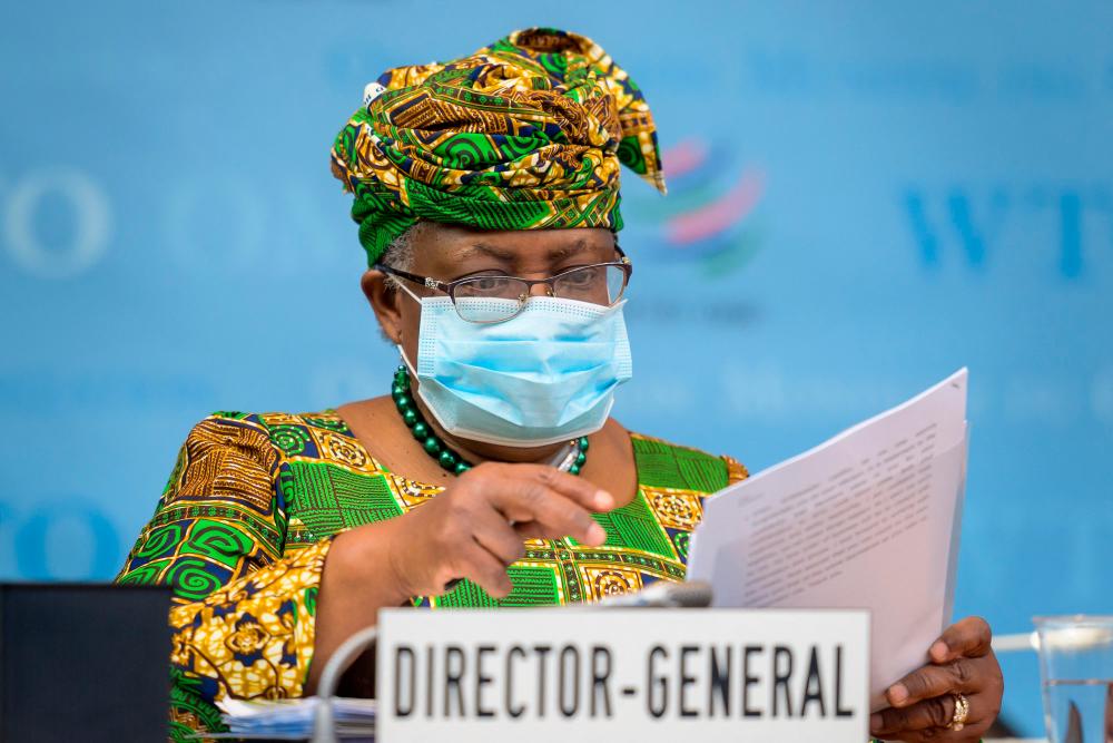 Hope for new momentum as Nigeriaâs Ngozi takes the reins at WTO Hope for new momentum as Nigeriaâs Ngozi takes the reins at WTO
