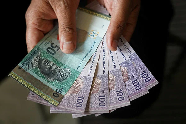 Ringgit opens higher but faces pressure from safe-haven dollar