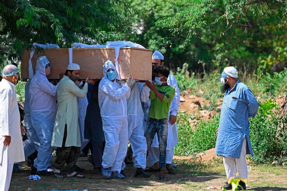India passes 300,000 Covid-19 deaths: health ministry