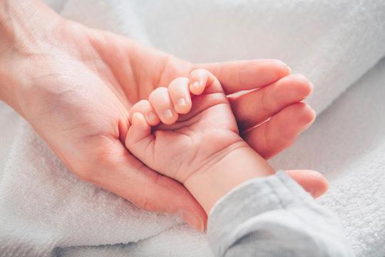 Indonesian parents sell their newborn son to pay off hospital bills Indonesian parents sell their newborn son to pay off hospital bills