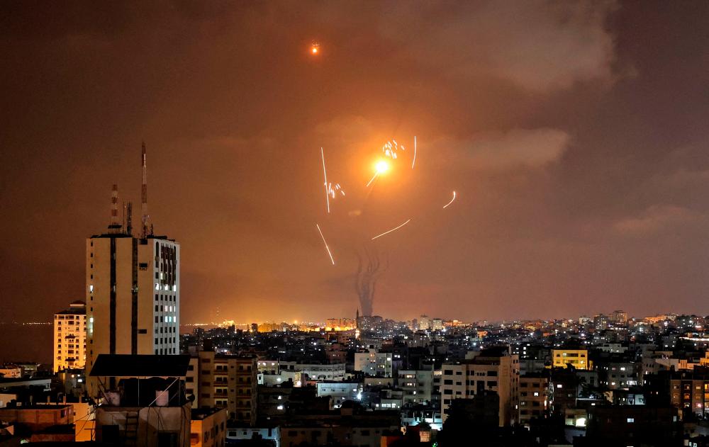 Israel-Palestinian conflict escalates as rockets fly, street violence flares Israel-Palestinian conflict escalates as rockets fly, street violence flares