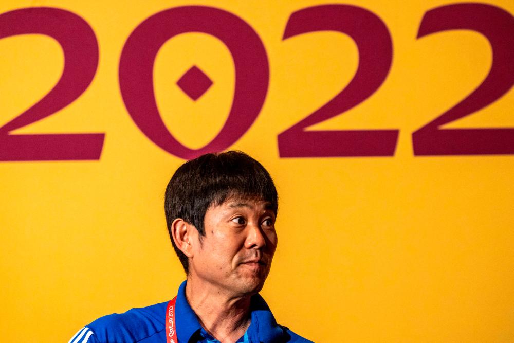 Japan coach urges players to believe in themselves in Spain clash