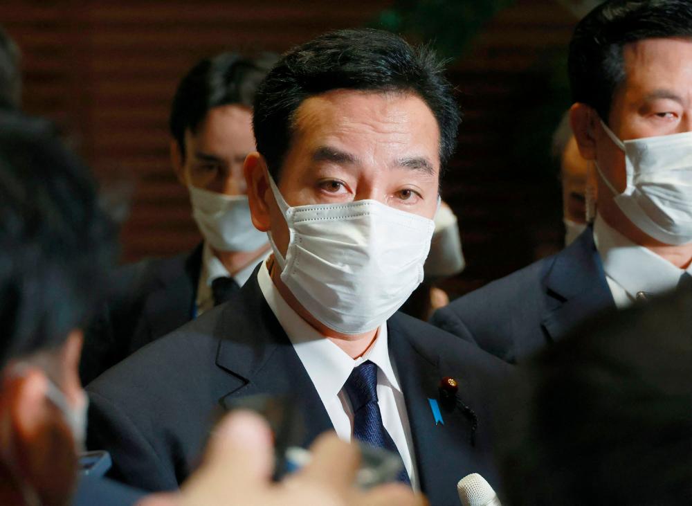 Japan minister resigns after Unification Church scrutiny