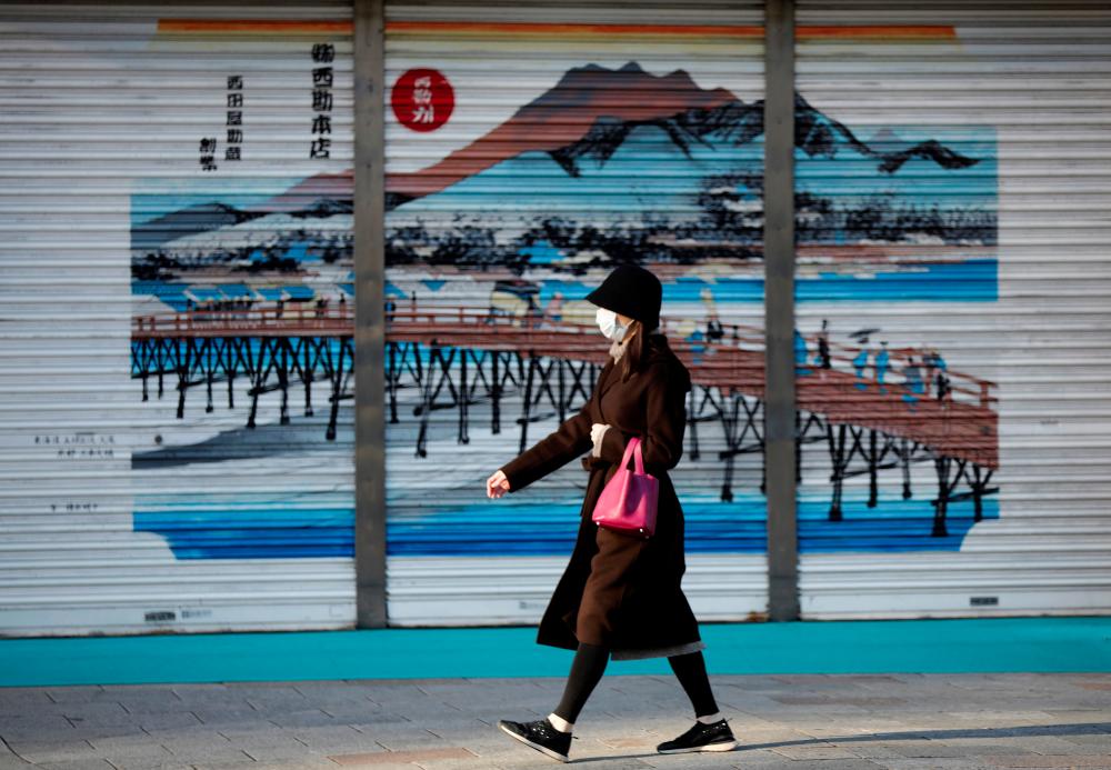 Japan to declare quasi-emergency in Covid-hit Okinawa - paper