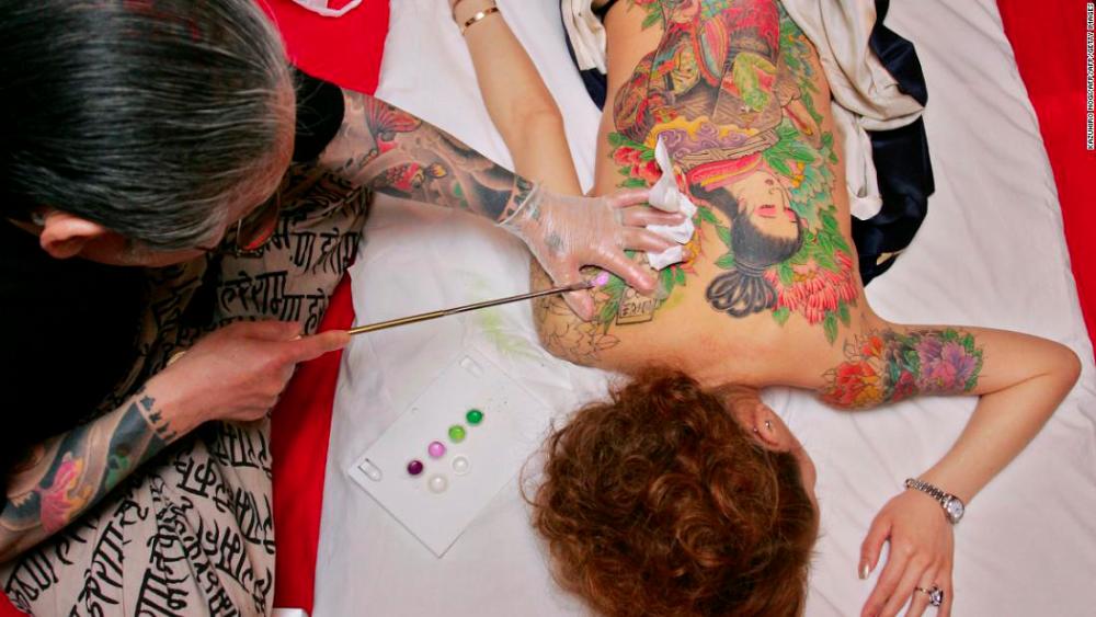 Japan top court sides with tattoo artist in test case