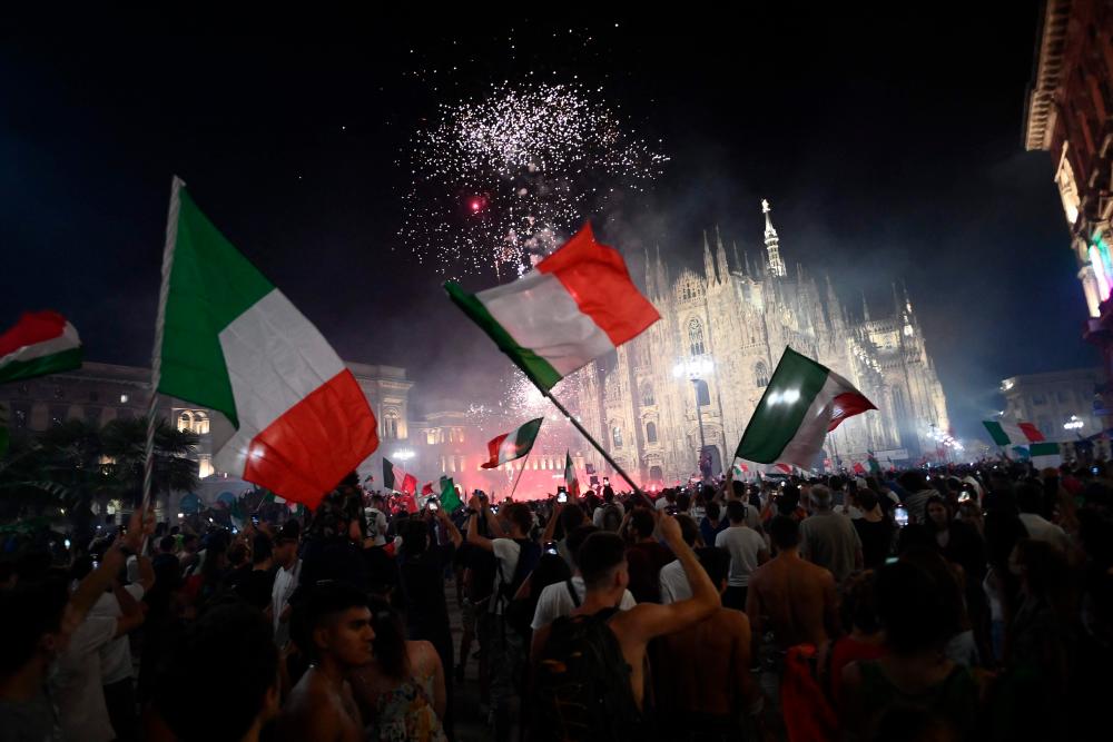 Jubilant Italians celebrate Euro 2020 victory to forget pandemic