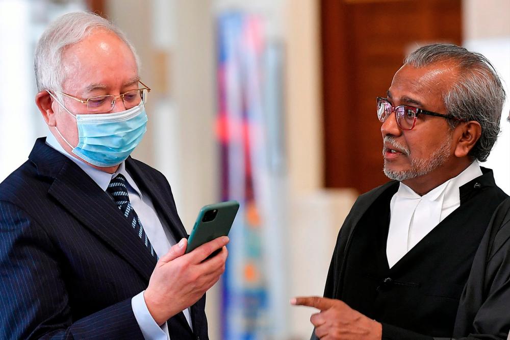 Lawyer Haniff Khatri fined RM30,000 for contempt, three others fined RM50,000 each