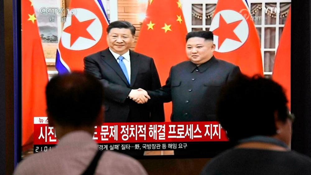 Leaders of China and North Korea vow to strengthen ties: KCNA Leaders of China and North Korea vow to strengthen ties: KCNA