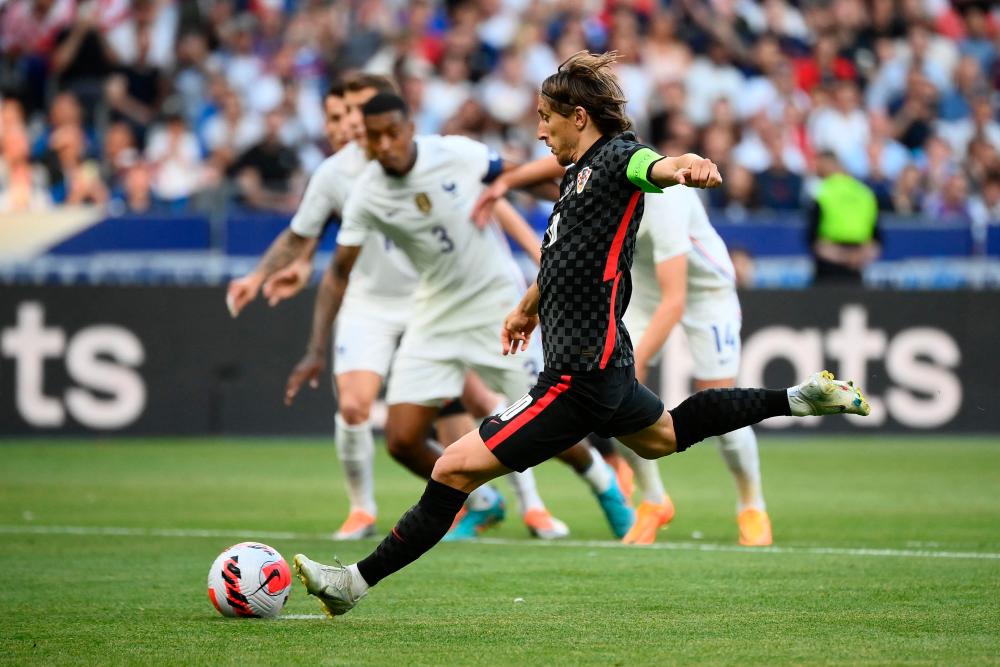 Majestic Modric gives Croatia victory in France