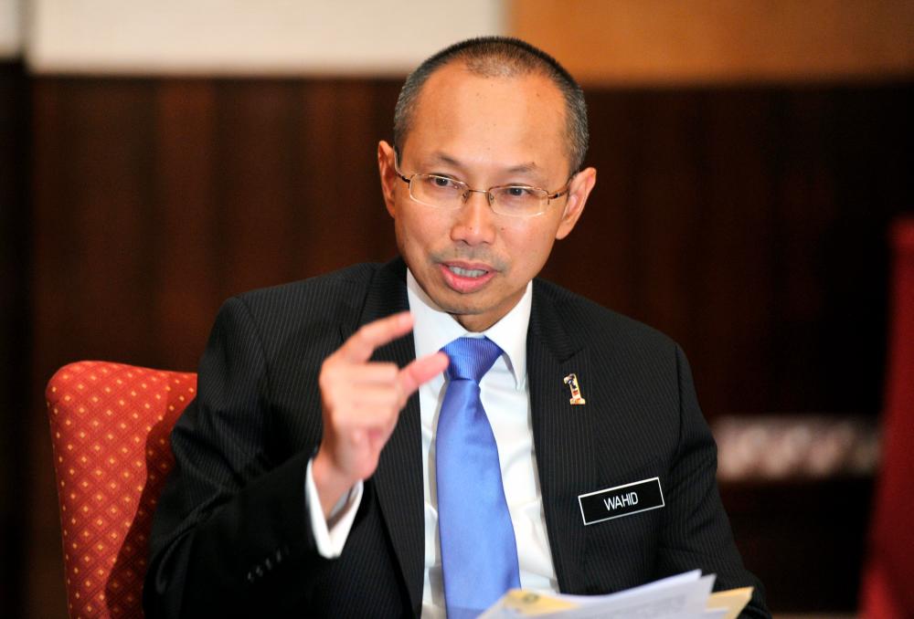Malaysian economy to build back better based on right approach, attitude - Wahid Omar Malaysian economy to build back better based on right approach, attitude - Wahid Omar