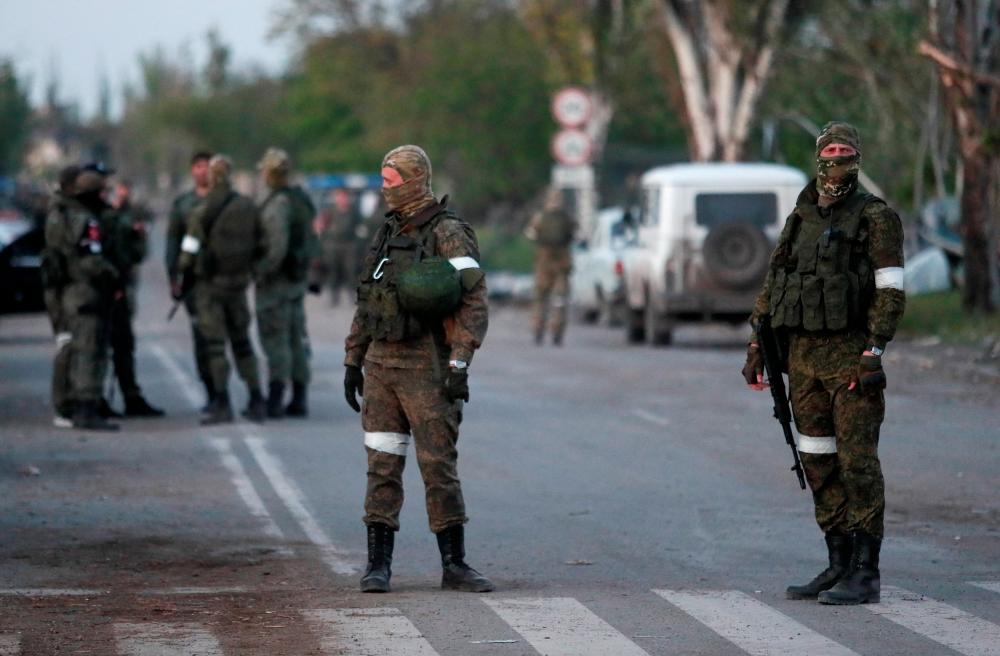 Mariupol defenders surrender to Russia but their fate is uncertain
