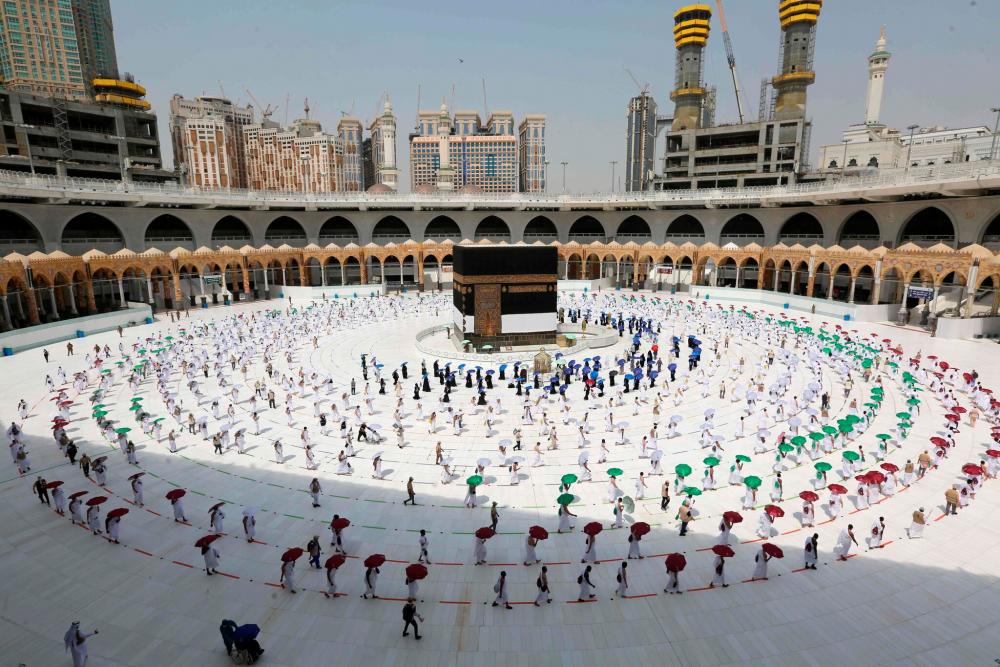 Mecca to reopen for limited pilgrimages after 7-month pause for virus Mecca to reopen for limited pilgrimages after 7-month pause for virus