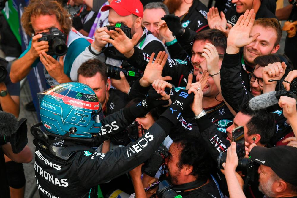 Mercedes driver Russell wins his maiden F1 Grand Prix Mercedes driver Russell wins his maiden F1 Grand Prix