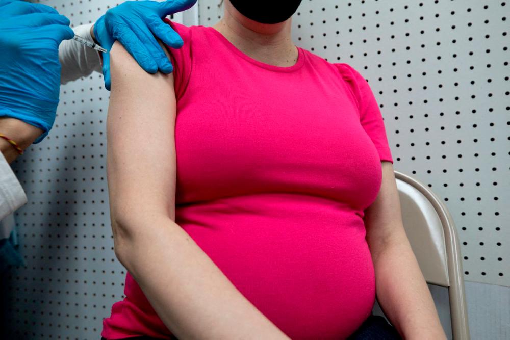 MoH urges pregnant women to get Covid-19 booster shot MoH urges pregnant women to get Covid-19 booster shot