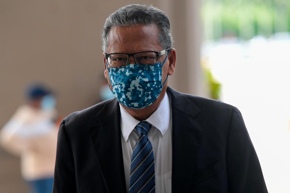 Mohamed Apandi's suit against Dr Mahathir, govt heads to trial as mediation fails Mohamed Apandi's suit against Dr Mahathir, govt heads to trial as mediation fails