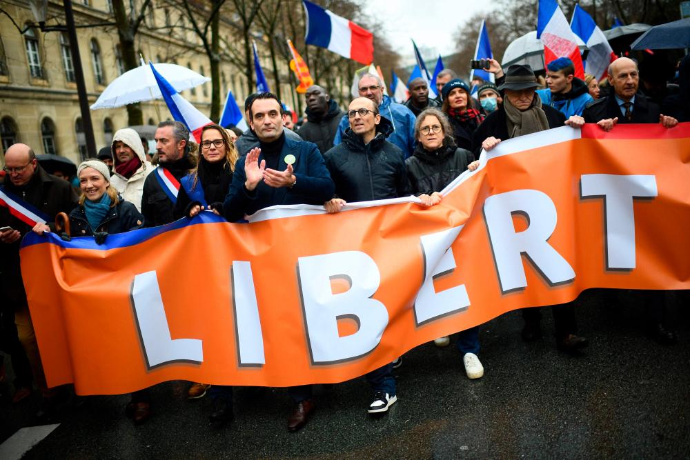 More than 100,000 march in France against Covid vaccine needs More than 100,000 march in France against Covid vaccine needs