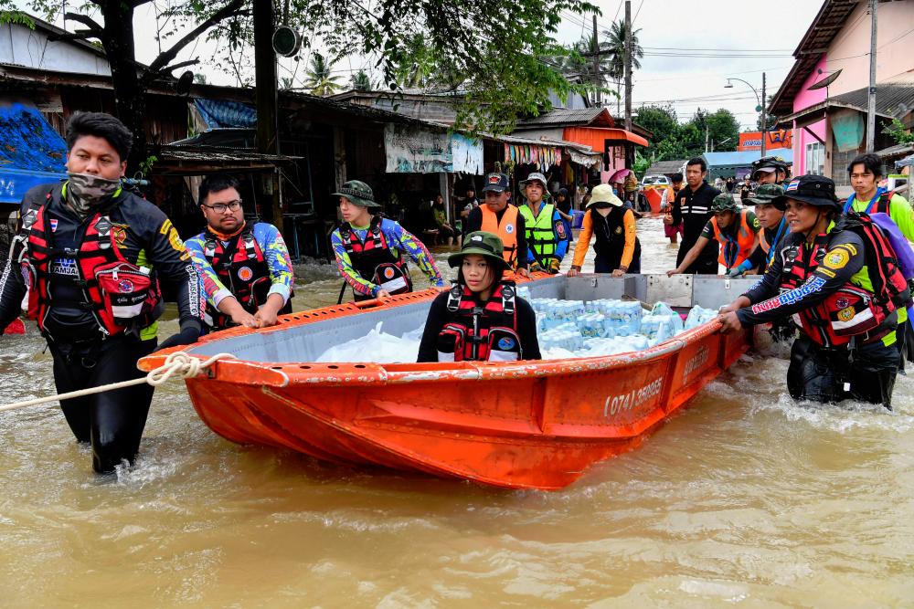More than 250,000 households hit by floods in southern Thailand in wake of heavy rain