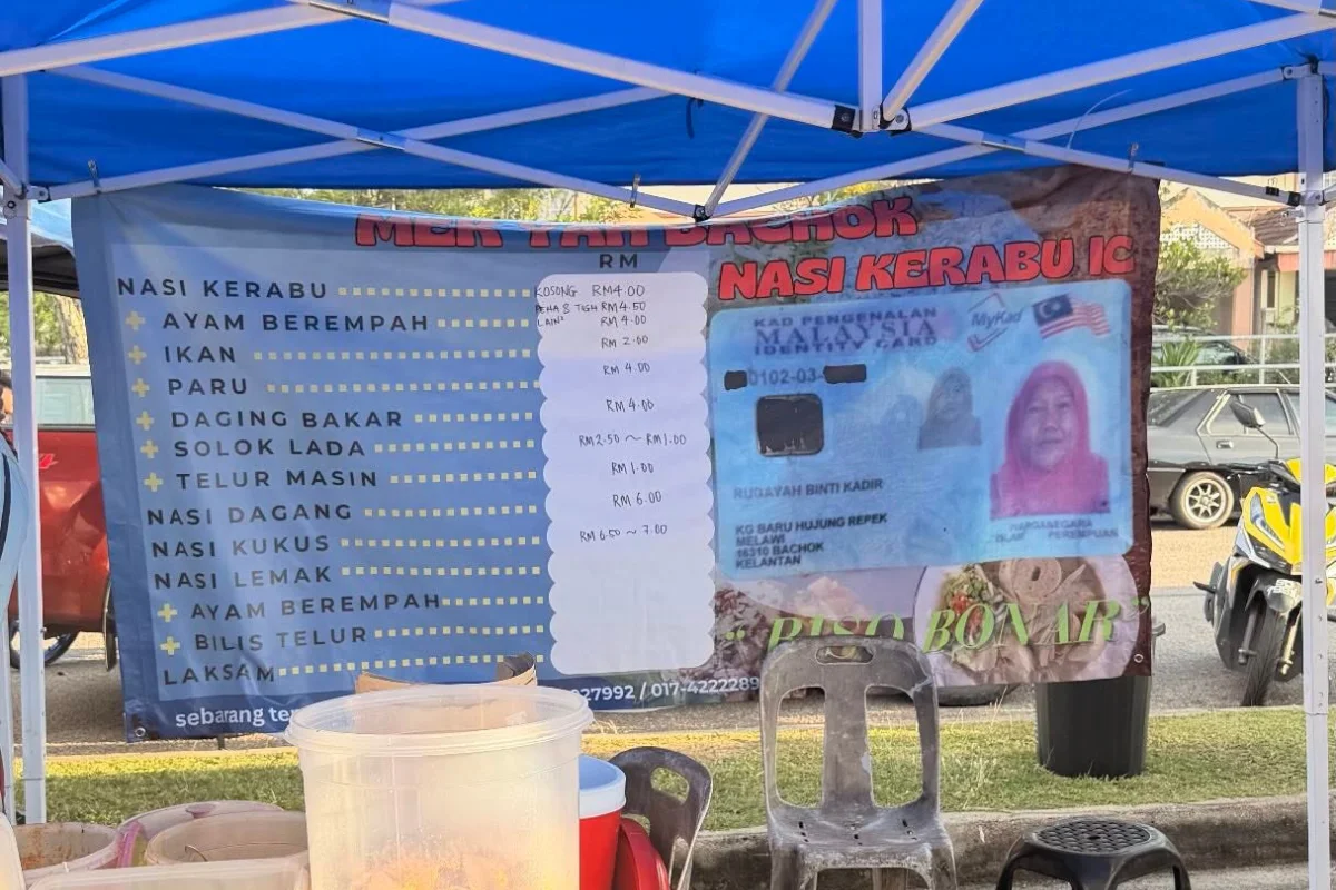 Nasi_kerabu_vendor_proves_she_s_Kelantanese_with_IC_banner