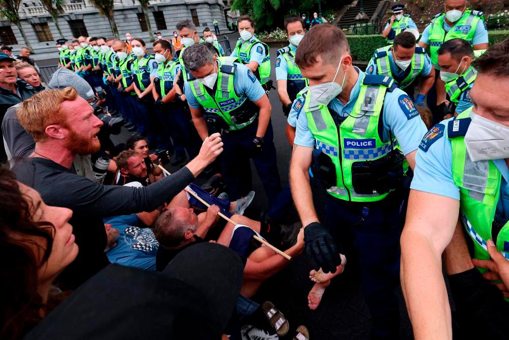 New Zealand police say anti-vaxxers hurled human waste New Zealand police say anti-vaxxers hurled human waste