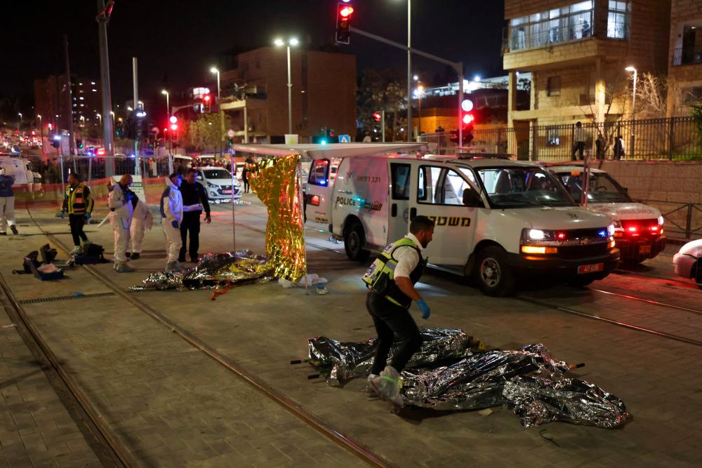 New gun attack in east Jerusalem after synagogue mass shooting New gun attack in east Jerusalem after synagogue mass shooting
