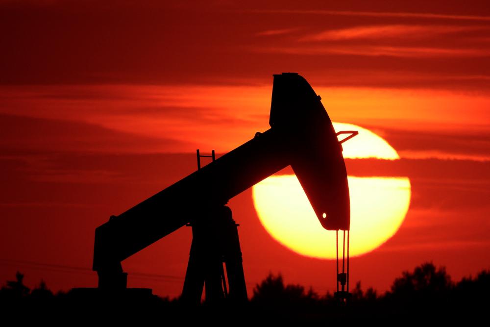 Oil  prices skid on possible Iran oil exports, rising interest rates