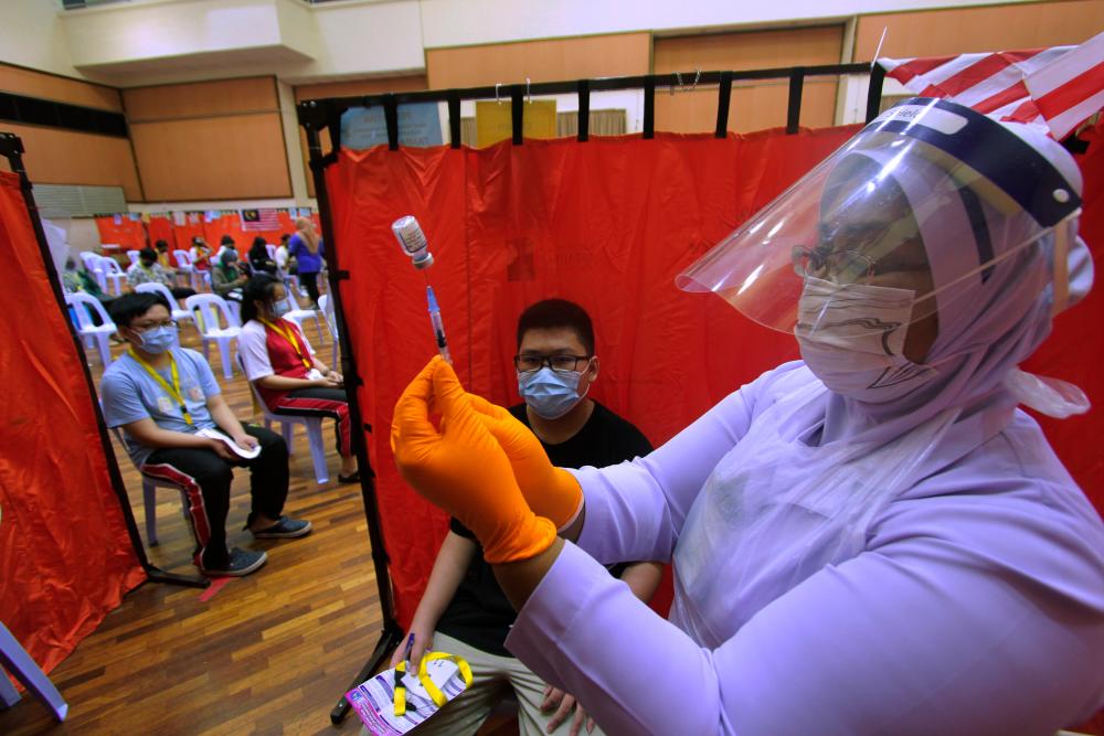 Over 21 million of Malaysiaâs adult population fully vaccinated against Covid-19