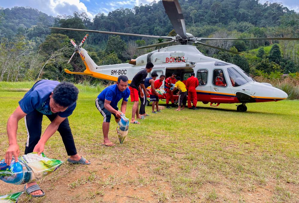 Over 23,000 kg of food supply delivered by helicopters to Orang Asli villages Over 23,000 kg of food supply delivered by helicopters to Orang Asli villages