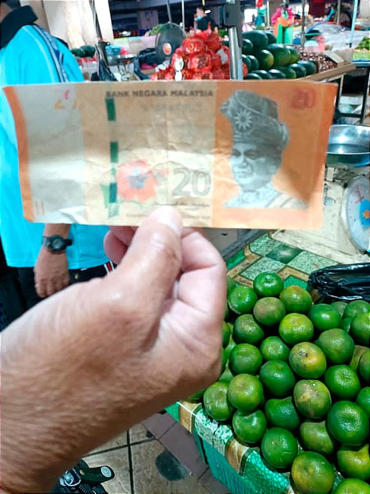 Peniaga Pasar Tamu Sibu Jaya jadi mangsa tipu guna wang palsu RM20