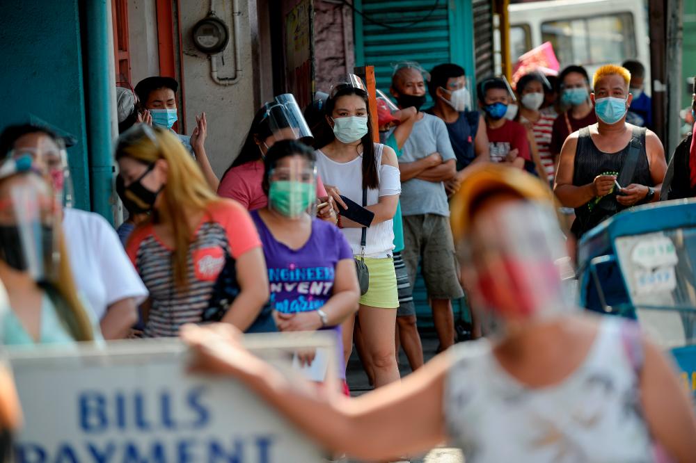 Philippines sees 10,000 new Covid-19 cases as tight curbs return to capital