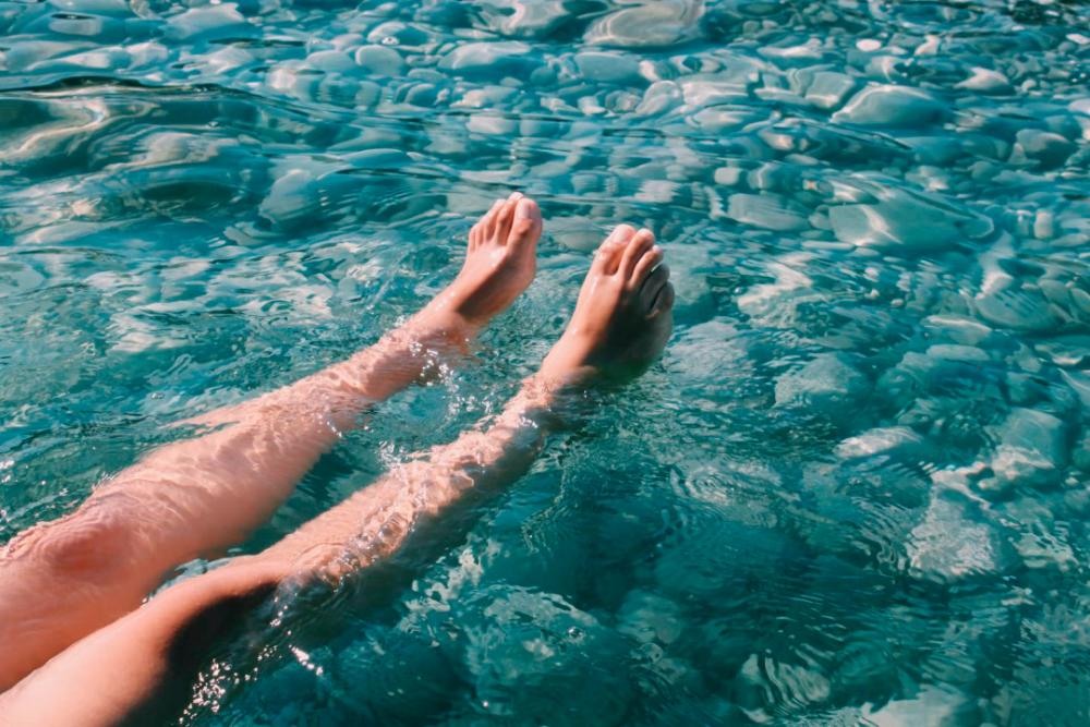 Police find body of semi-nude woman in river waste trap Police find body of semi-nude woman in river waste trap