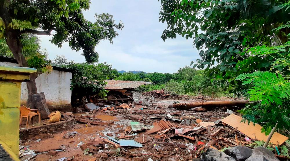 Rescuers hunt for survivors after cyclone wreaks havoc in Indonesia