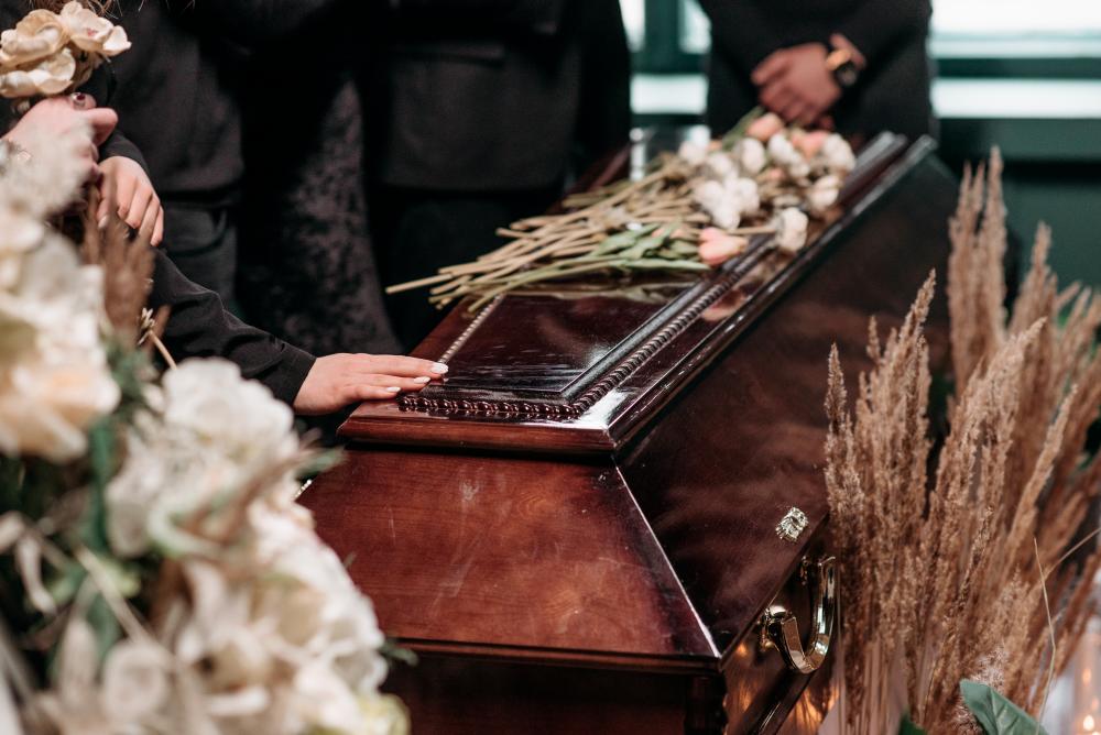 Restaurant owner brings Muslim staff to church funeral