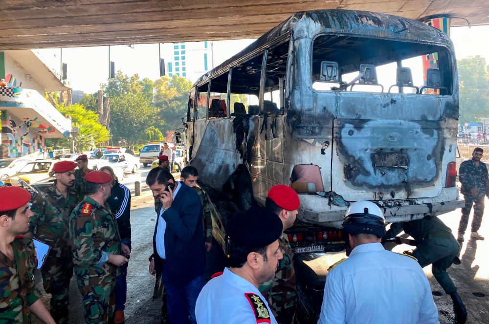 Roadside bomb attack kills 13 Syrian military personnel in Damascus - state TV Roadside bomb attack kills 13 Syrian military personnel in Damascus - state TV