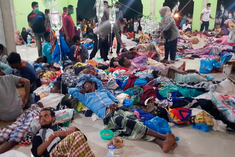 Rohingya recount stories of hunger and desperation in escape to Indonesia