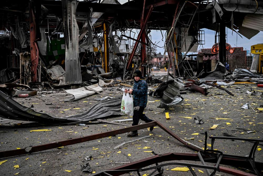 Russia hits Ukraine from air, land and sea with civilians trapped Russia hits Ukraine from air, land and sea with civilians trapped