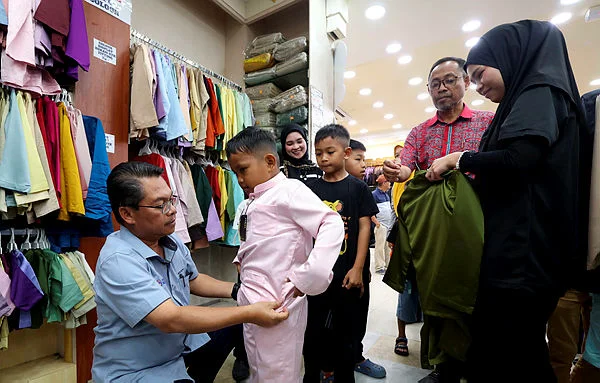 SB04_19032026_BAJU_RAYA Madani government pledges stable supply of basic goods in Sabah, Sarawak