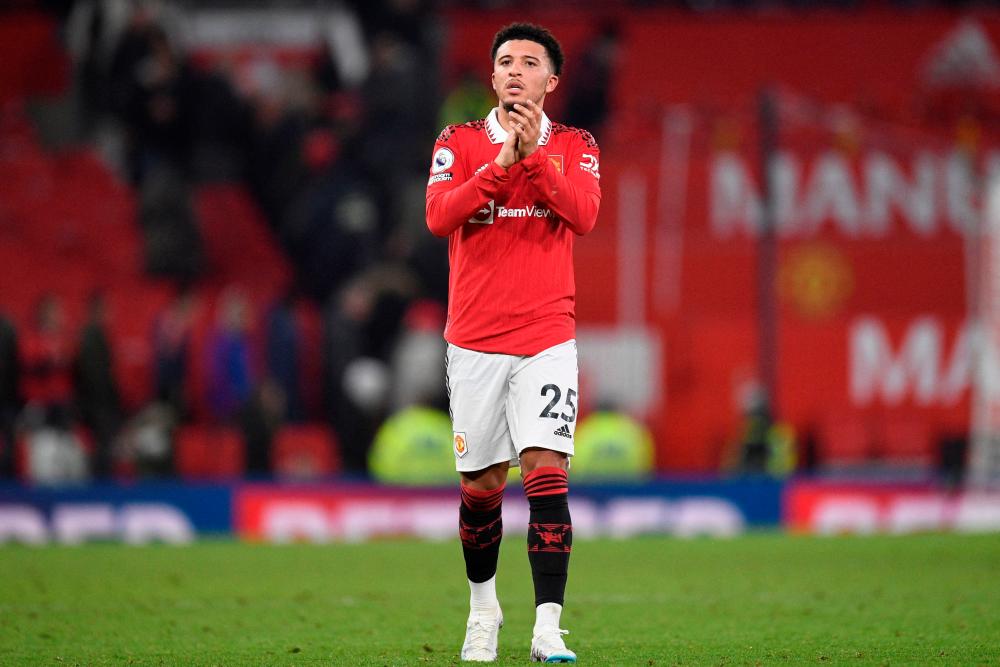 Sancho salvages Man Utd draw with managerless Leeds