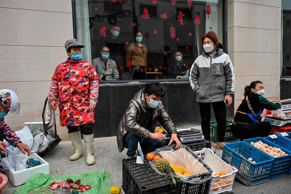 Shanghai residents frustrated by food shortages, prolonged lockdowns