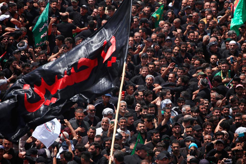 Shiite Muslims throng Iraqi shrine city to mark Ashura