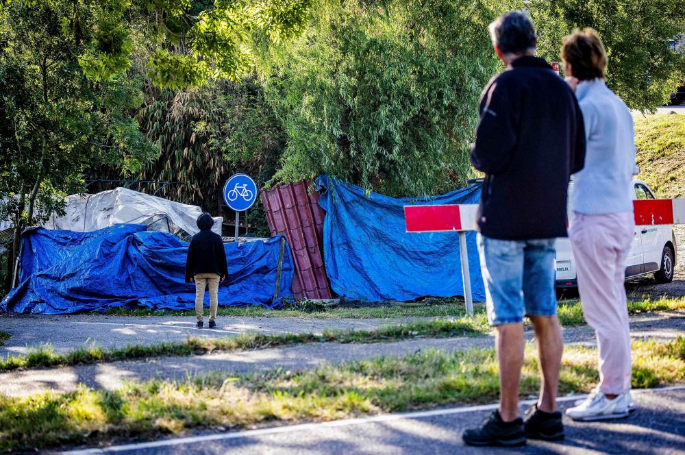 Six killed in Netherlands as truck rolls off road into neighbourhood party