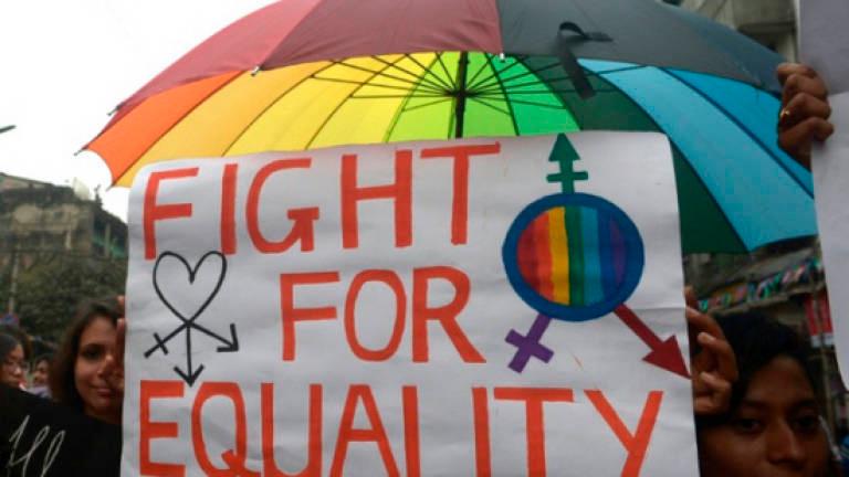 S’pore lifts gay sex ban, blocks marriage equality