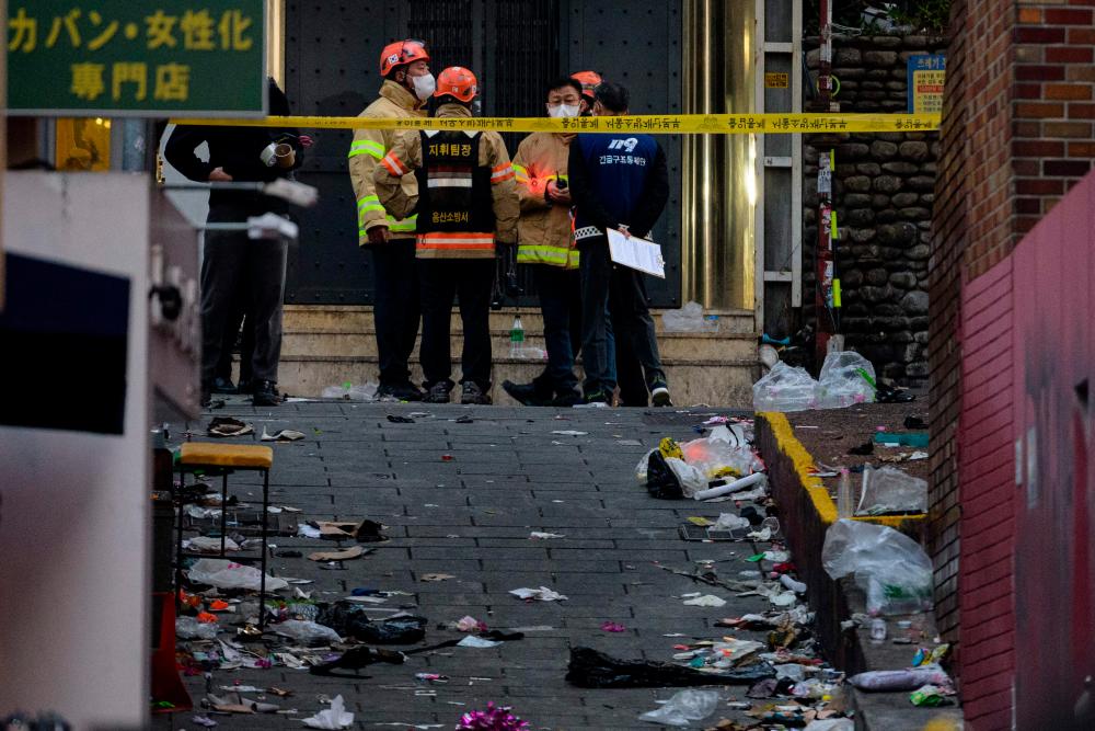 Sudden crowd surge at narrow 4-metre-wide downward alley blamed for deadliest stampede
