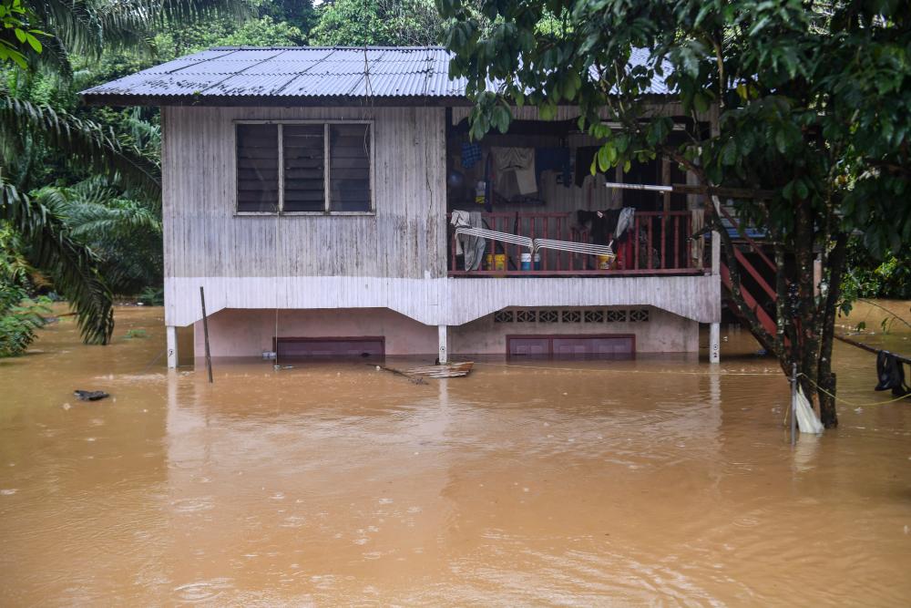 Terengganu floods: Family worries house will be swept away again