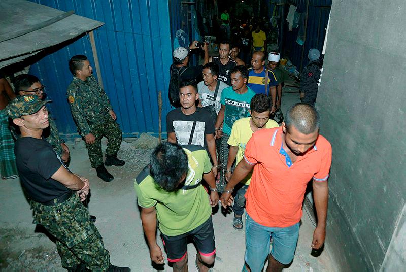 Thai police detain 89 Myanmar nationals waiting to be smuggled into Malaysia Thai police detain 89 Myanmar nationals waiting to be smuggled into Malaysia