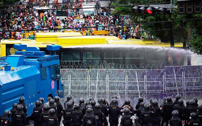 Thai police fire water cannon, teargas at parliament protest