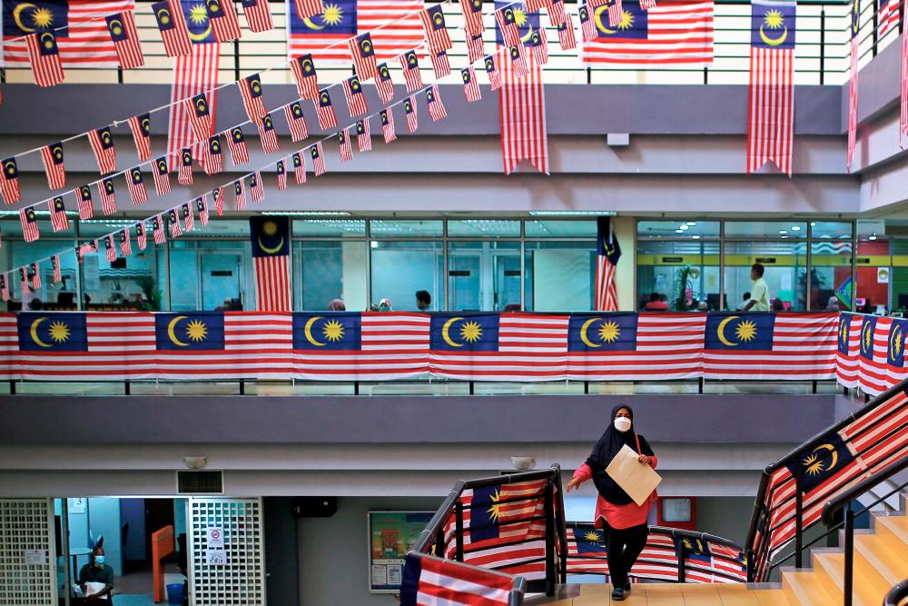 Three races join hands to install 12,000 Jalur Gemilang at PPR Three races join hands to install 12,000 Jalur Gemilang at PPR