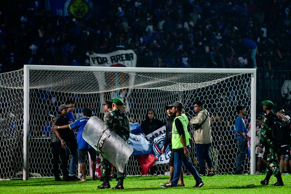 Tough action awaits police and military members responsible for Kanjuruhan stadium incident Tough action awaits police and military members responsible for Kanjuruhan stadium incident