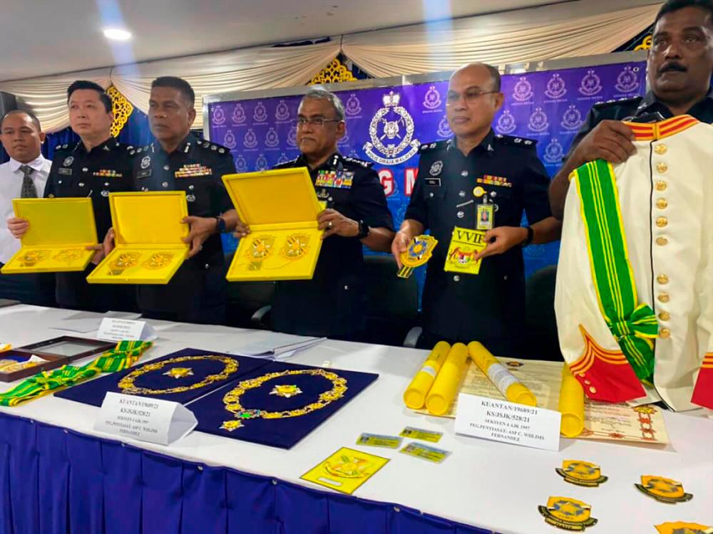 Two civil servants to be charged tomorrow over sale of Pahang state titles Two civil servants to be charged tomorrow over sale of Pahang state titles